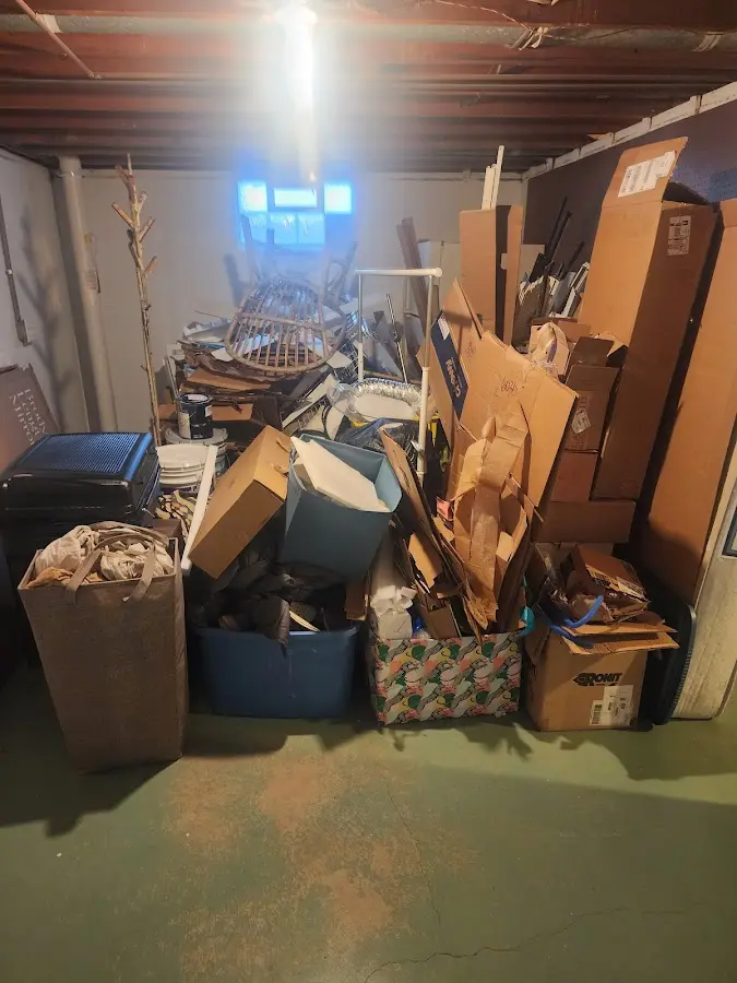 Roll-off dumpster container at job site for 20 Yard Dumpster Rental in Fall River